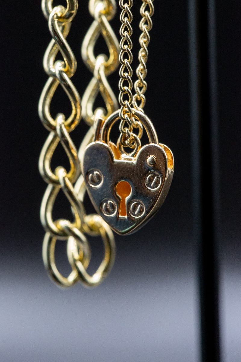 9ct Yellow Gold Ladies Curb Link Heart Lock Bracelet 7.5 Inch