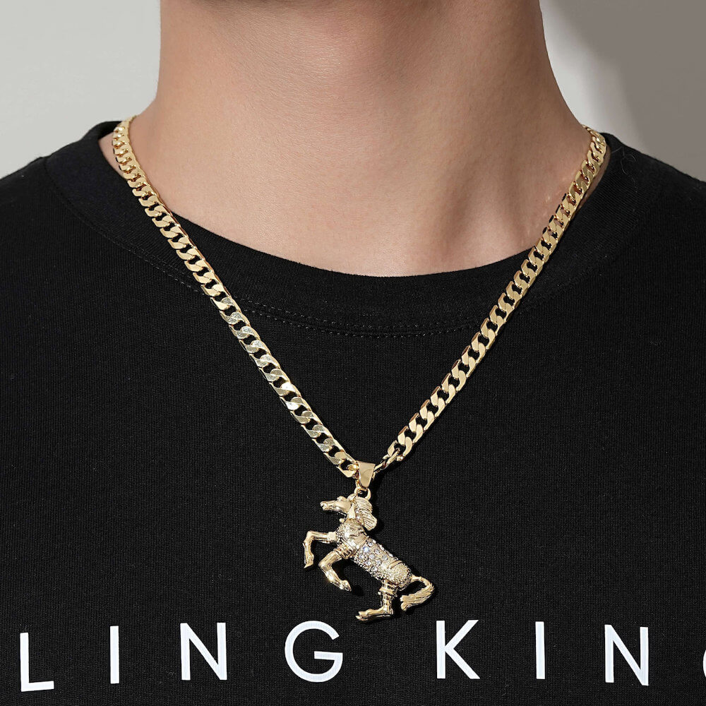 gold horse pendant with pink stones on a 24-inch 4mm thick Cuban chain