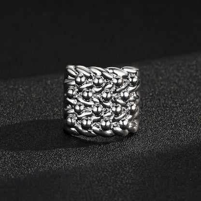 Close-up of a shiny silver keeper ring with a 23mm square top