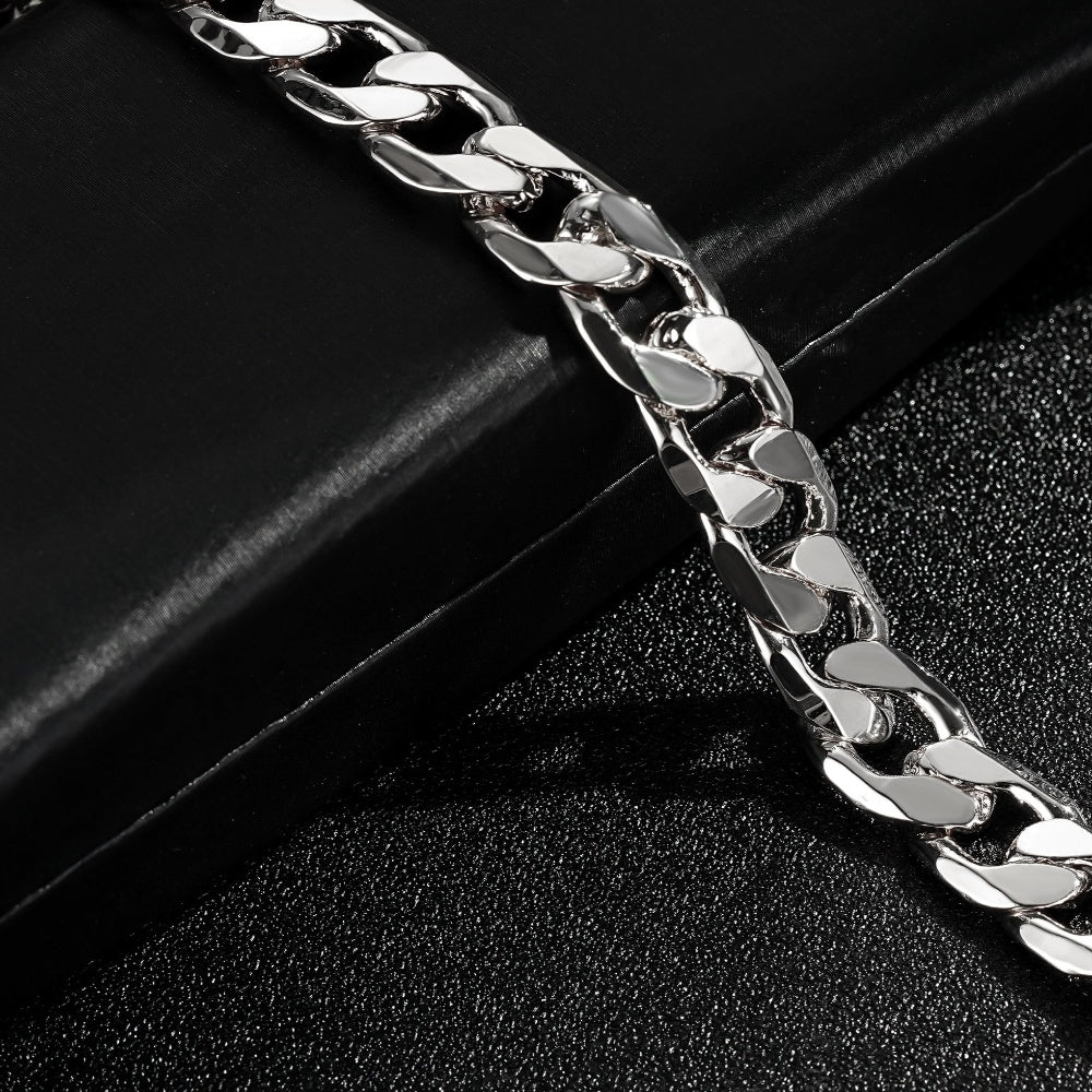 Lightweight silver Cuban bracelet, 9mm wide, 8 inches, 21 grams, Cuban curb design.