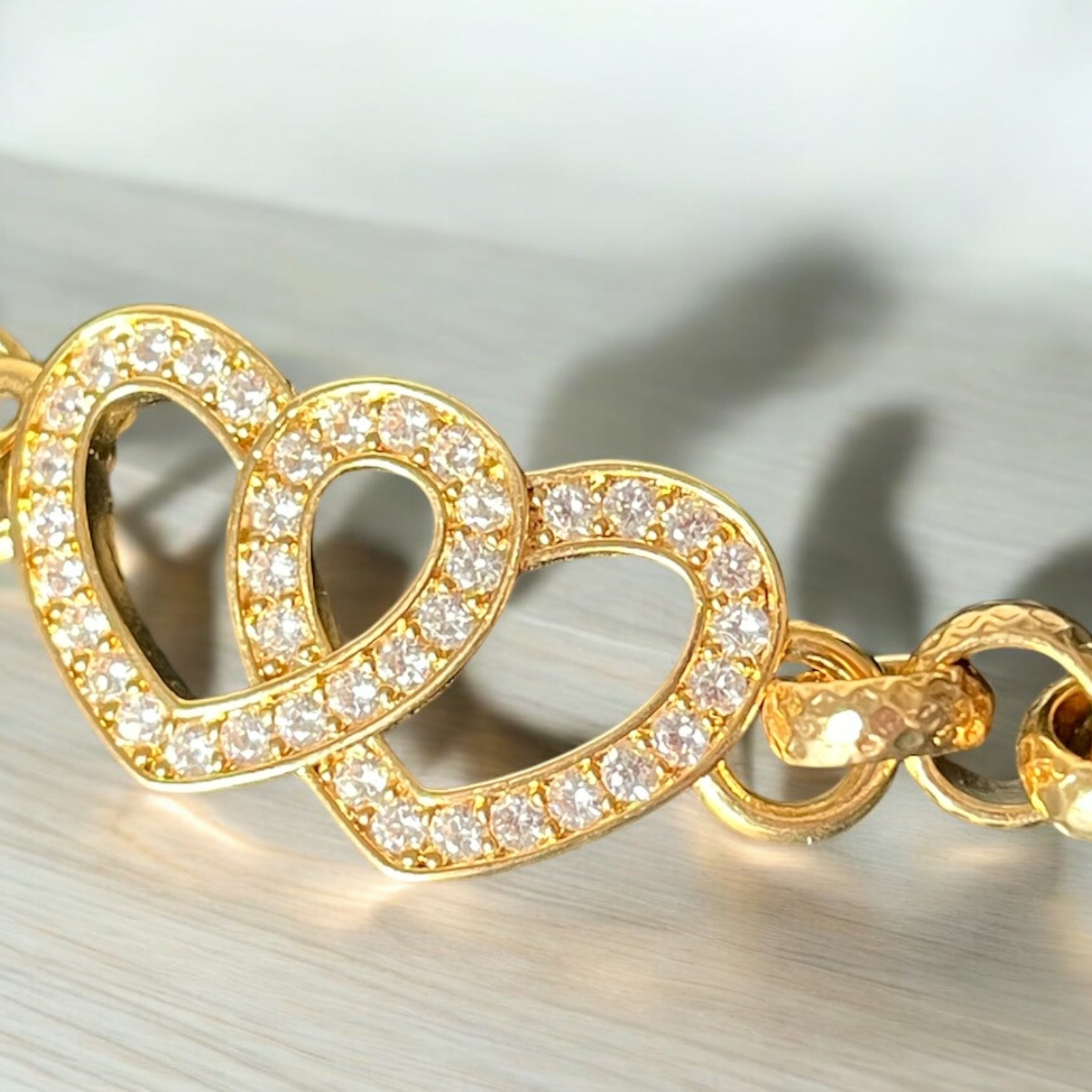 6-6.5 inch gold double heart Belcher bracelet, 8mm wide, 26 grams, gold-filled finish.