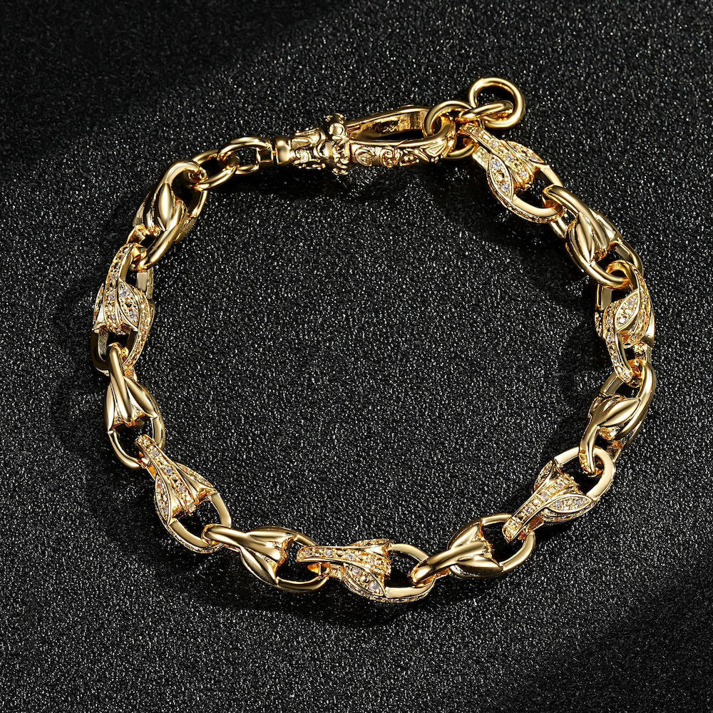 Small gold tulip bracelet with stones, 9mm wide, 8 inches long, 29 grams.