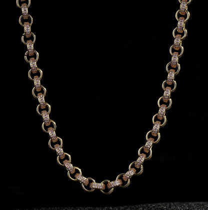 Detailed View of Gold Belcher Chain with Pink Stones