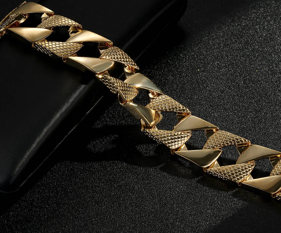 Big gold Cuban bracelet with snake pattern, 22mm wide, 8 inches, 108 grams, gold-filled.