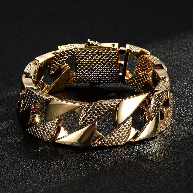 Chunky gold snake-patterned Cuban bracelet, 22mm wide, 8 inches long, 108 grams.