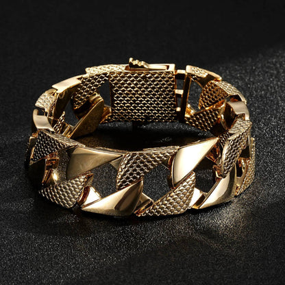 Chunky gold snake-patterned Cuban bracelet, 22mm wide, 8 inches long, 108 grams.