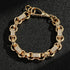 Gold gypsy link Belcher bracelet with stones, 10mm wide, 8 inches long, 45 grams.