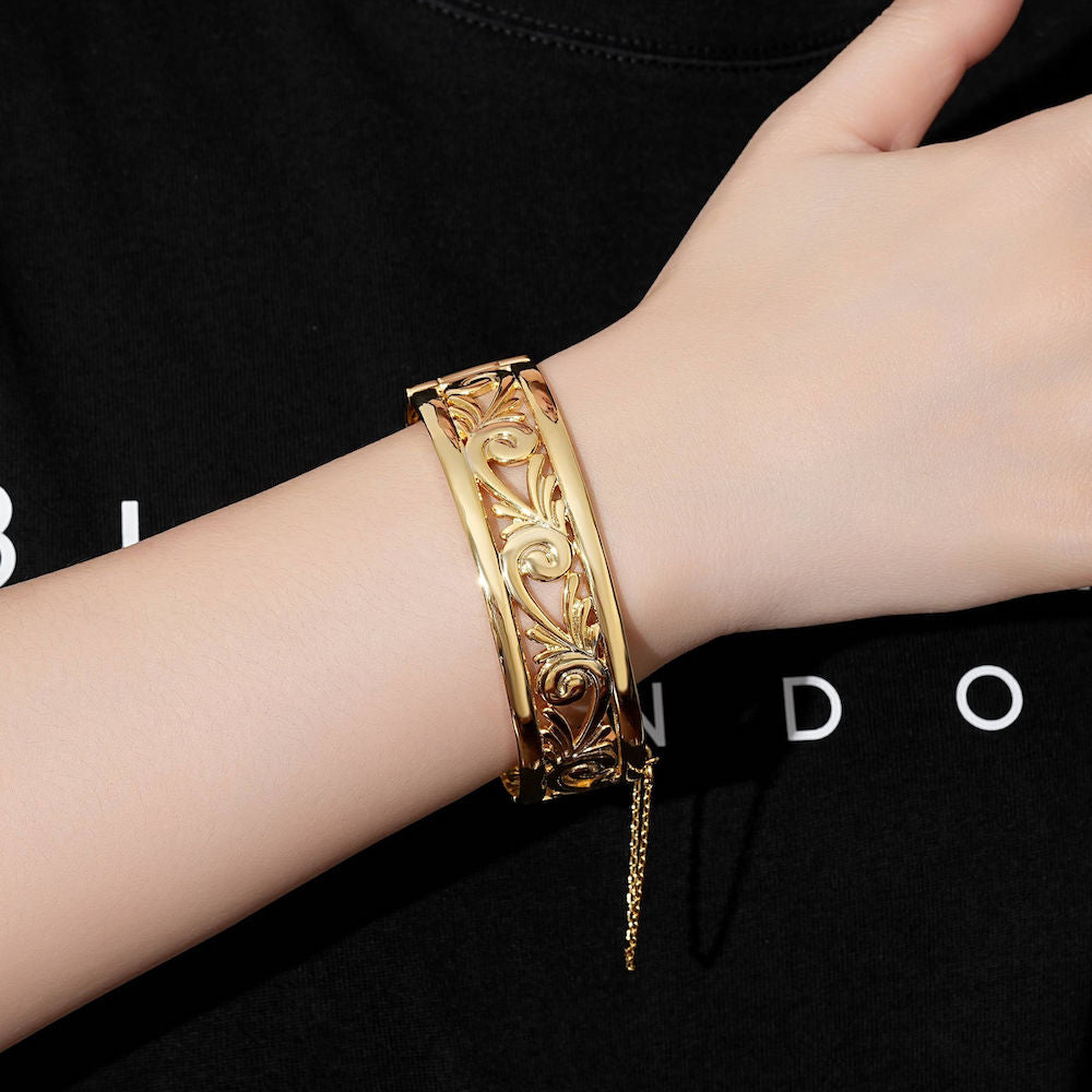 20mm wide gold filigree bangle, 46.5 grams, with safety chain, gold-filled finish.