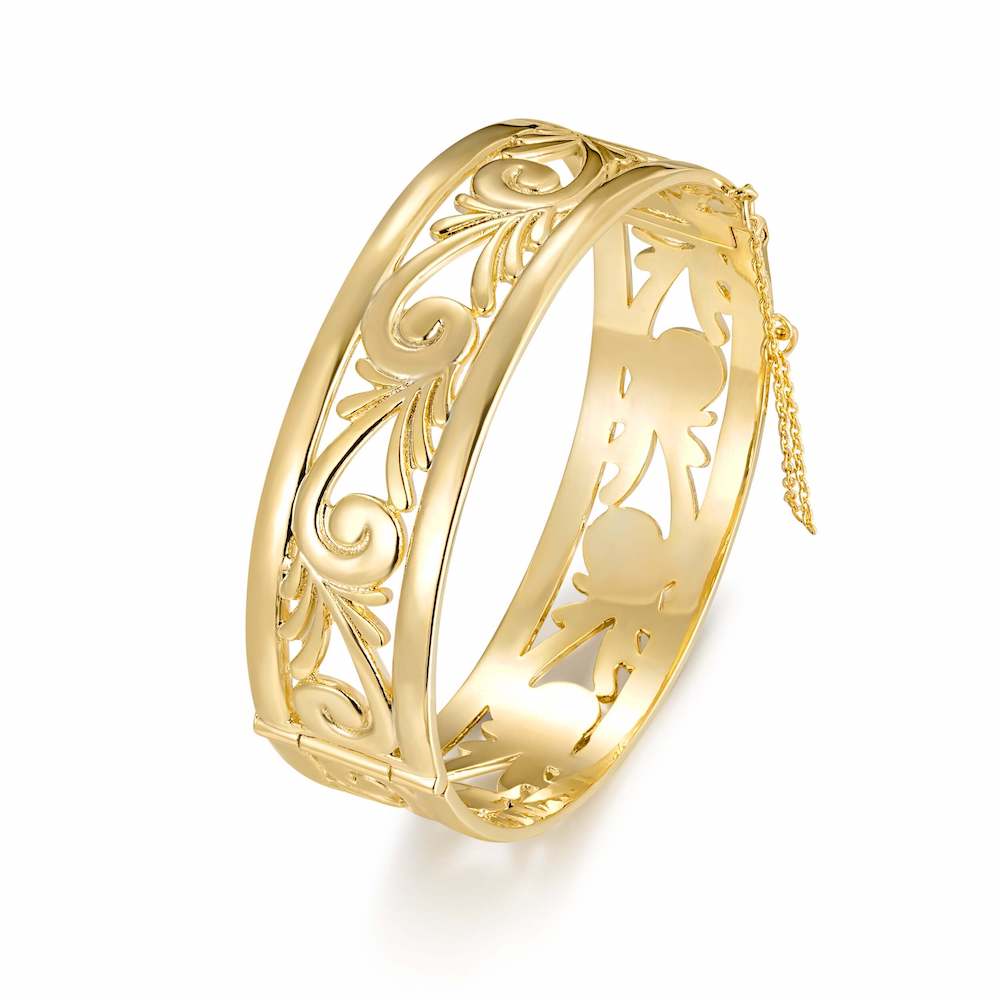 Chunky gold bangle with filigree design, 20mm width, 46.5 grams, safety chain.