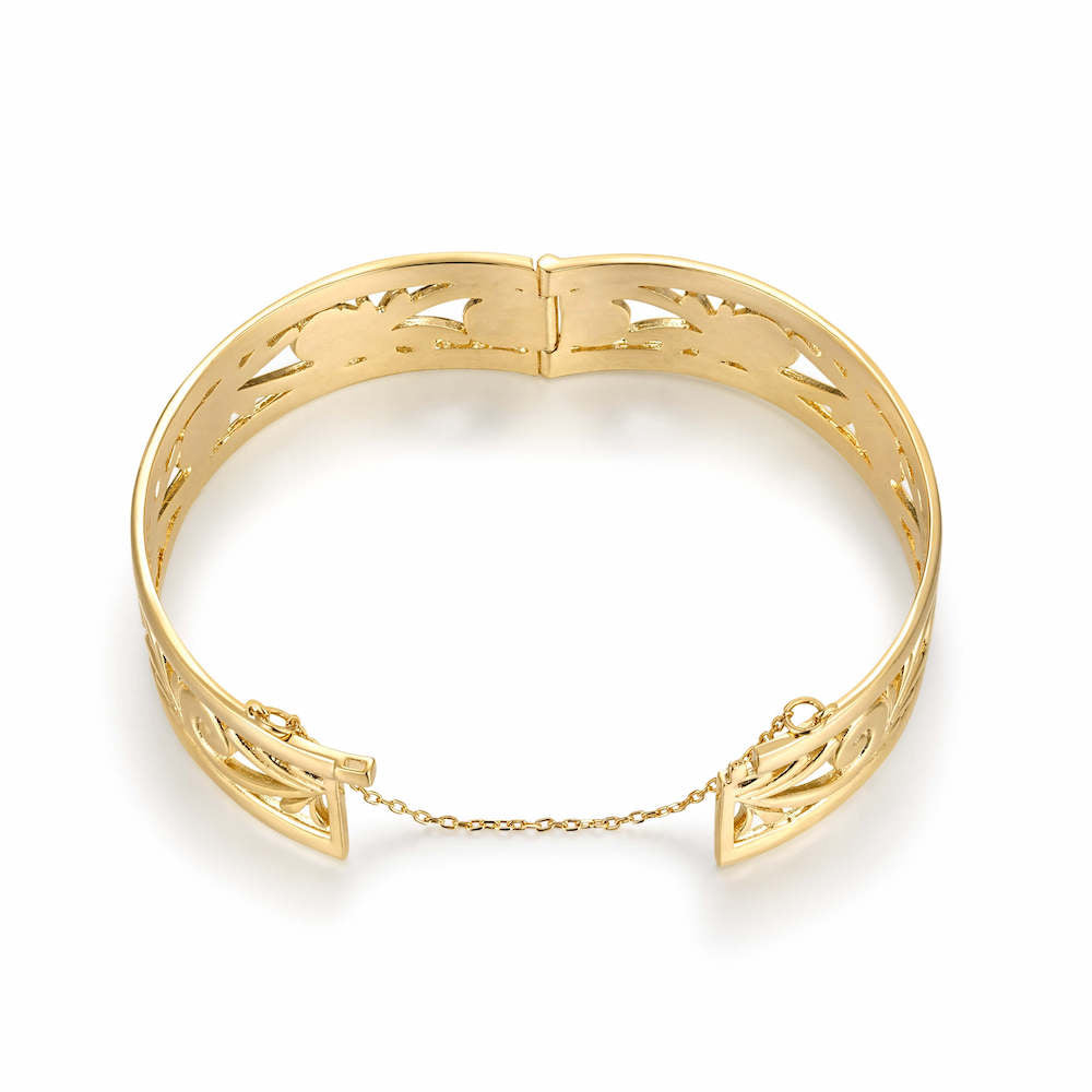 Chunky gold filigree bangle, 20mm wide, 46.5 grams, with safety chain.