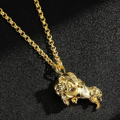 Close-up view of the gold bulldog pendant with sparkling stones