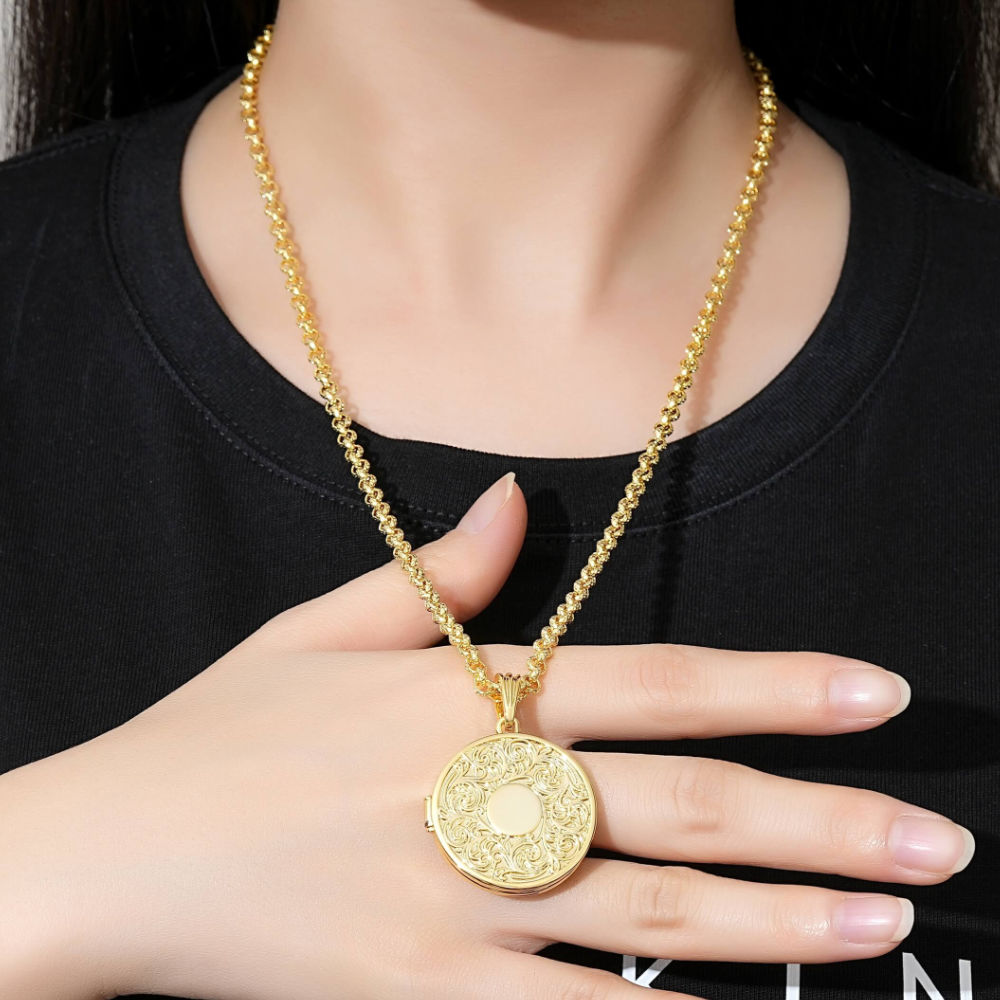 Person wearing Gold Locket Pendant Necklace