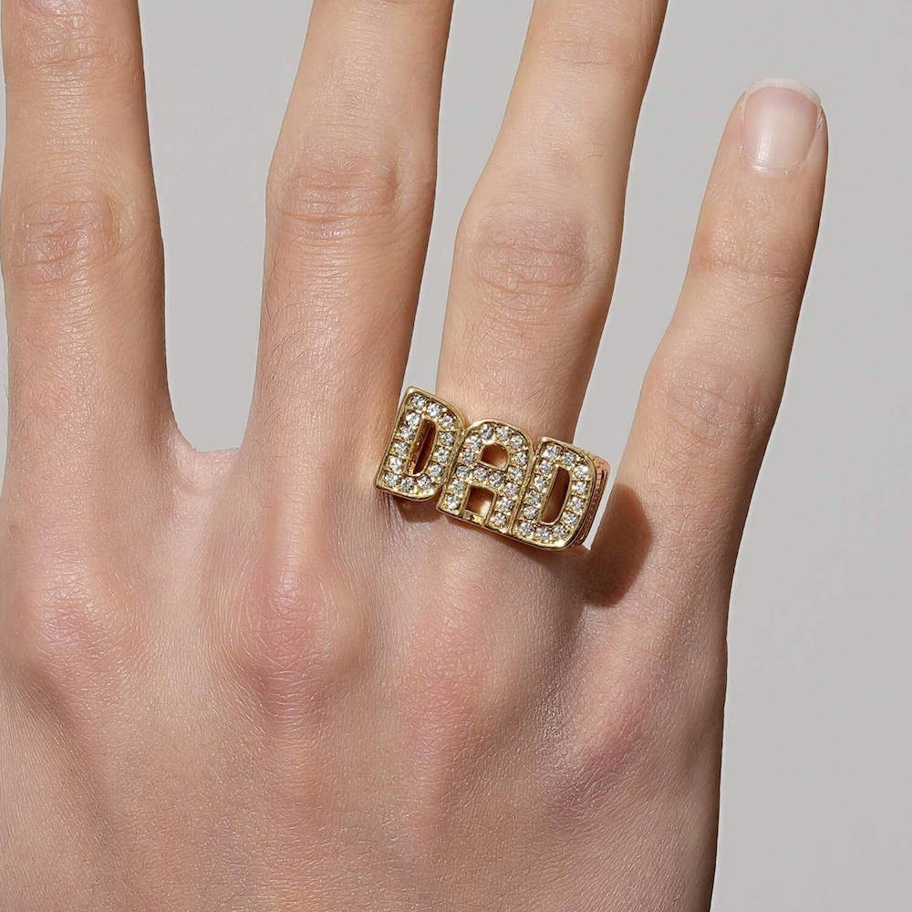 Adjustable gold dad ring with stone accents