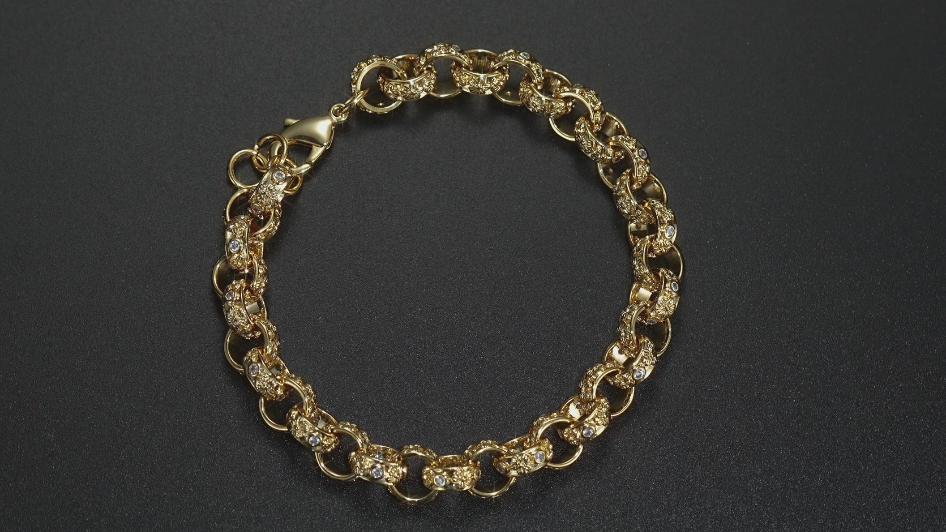 	Lightweight gold Belcher bracelet with crystals, 12mm wide, 9 inches, 52 grams, floral design.