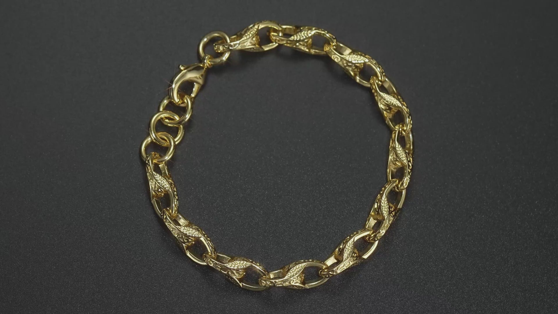 Lightweight gold tulip bracelet, 9mm width, 6/7 inches, 23 grams, 3D pattern.