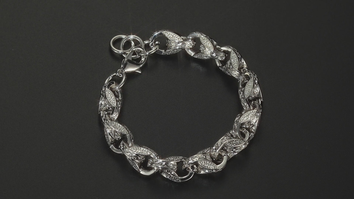 Lightweight silver tulip bracelet, 12mm width, 8/9 inches, 71 grams, 3D pattern.