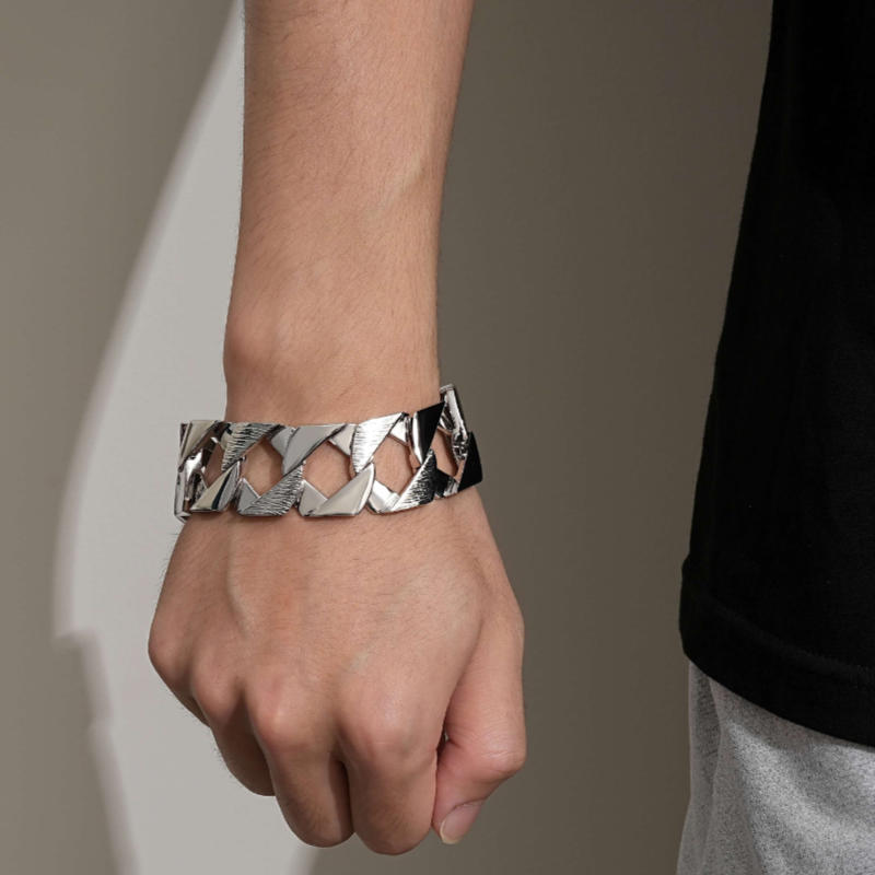 9-inch silver Chaps Cuban curb bracelet, 27mm wide, 120 grams, silver-filled finish.