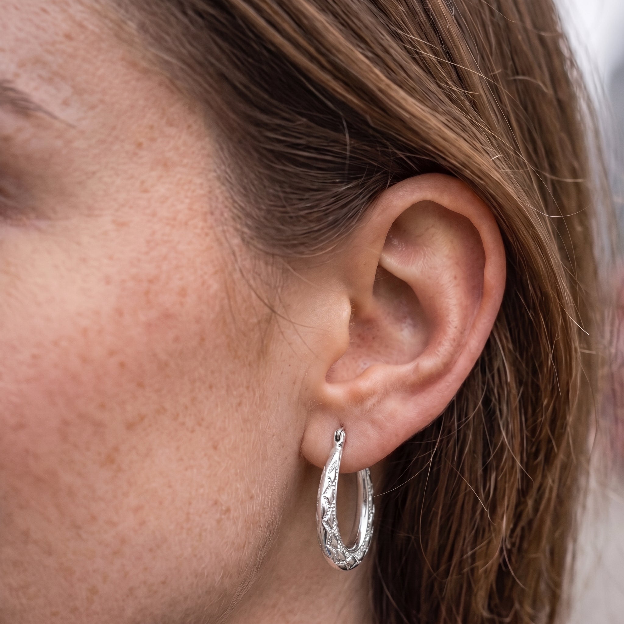 Silver Diamond-Cut Oval Creole Hoop Earrings 25mm