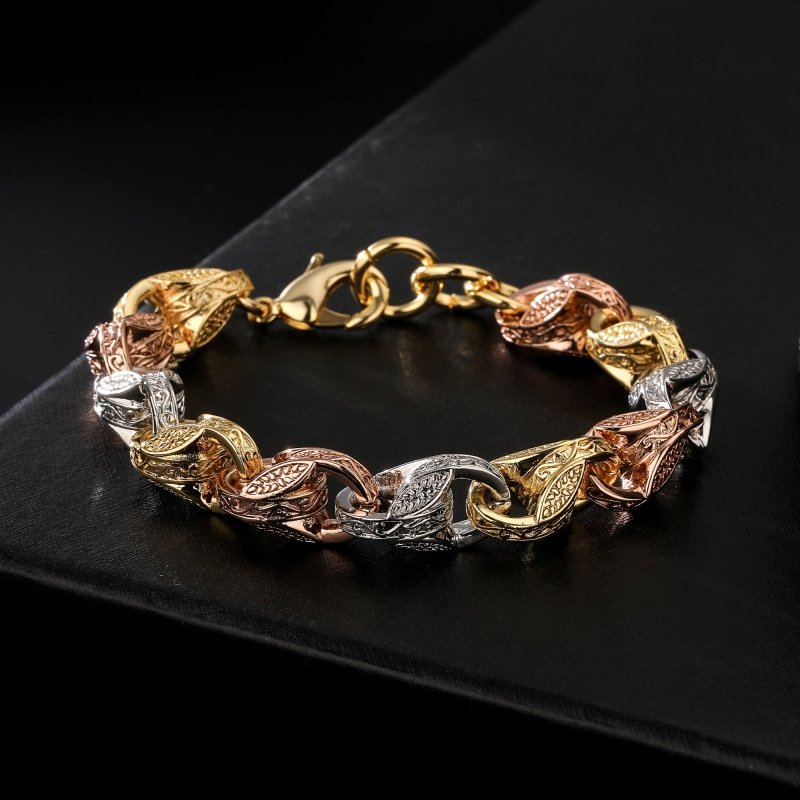 8/9-inch 3-tone tulip bracelet, 12mm wide, 72 grams, gold, rose gold, and silver.