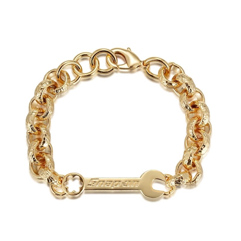 Patterned gold spanner bracelet, 12mm wide, 7.5/8 inches, 45 grams, gold-filled.