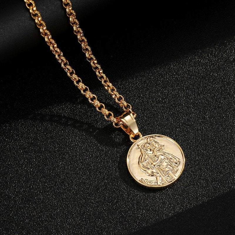 Gold St. Christopher pendant necklace in stylish packaging